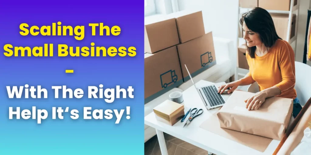 A woman is sitting at a table with a shipping box and a laptop