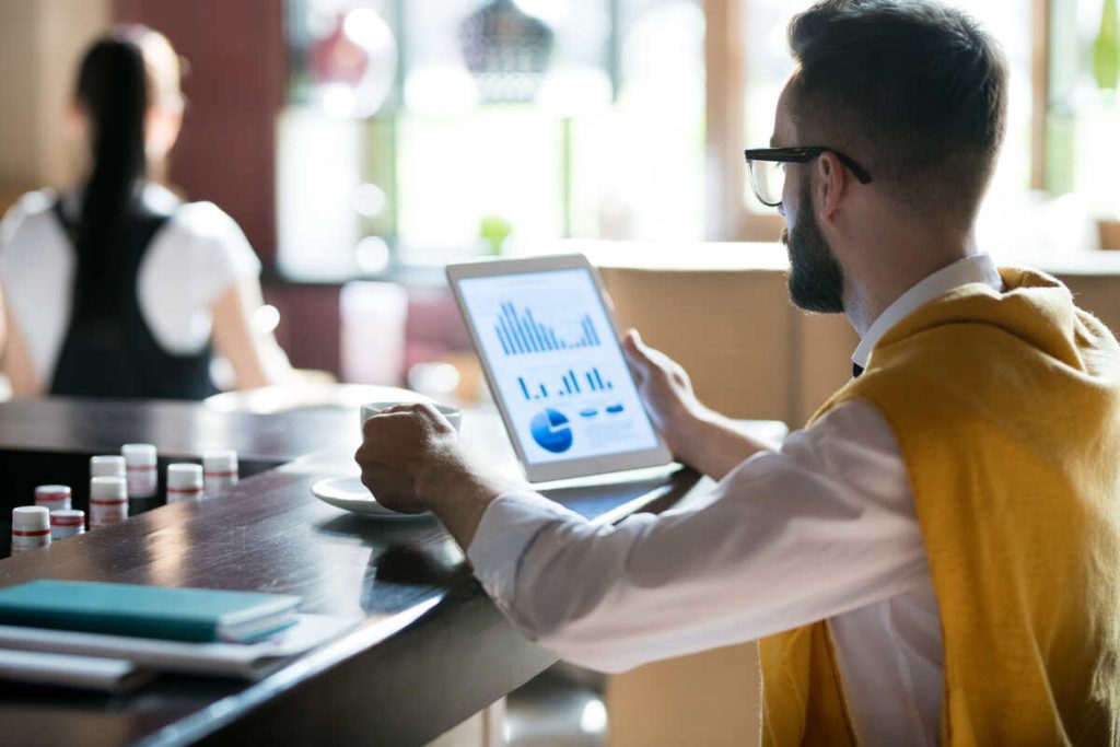 Businessman Working in Bar.