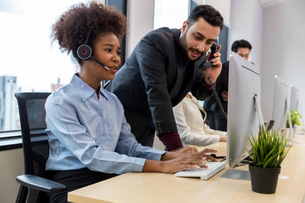 woman in the office talking with customer