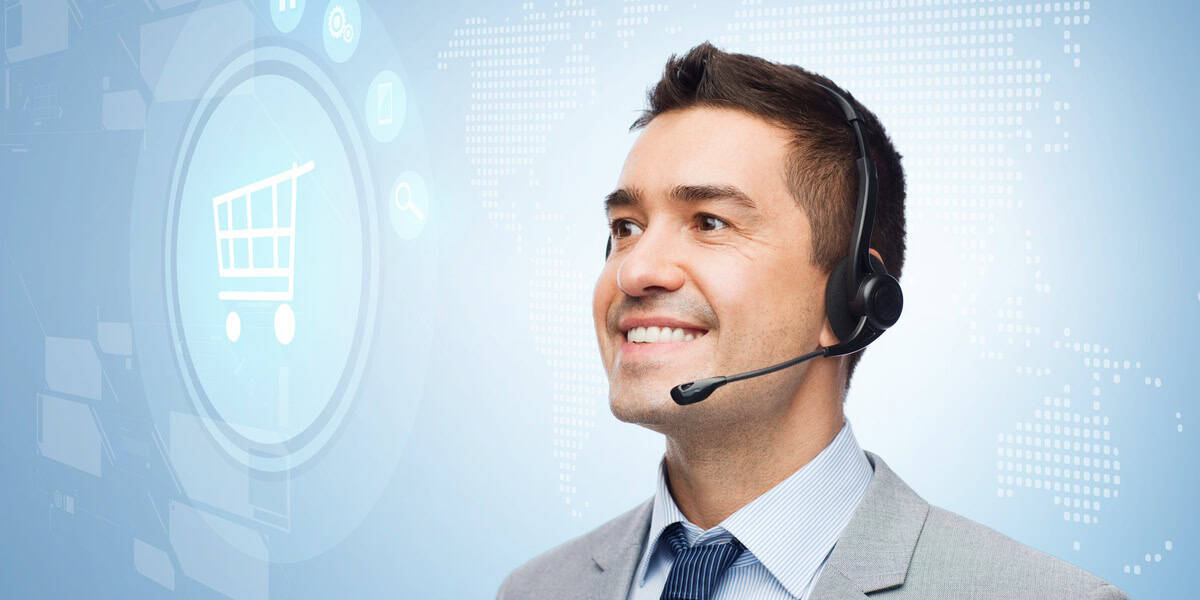 a man wearing a headset representing a hero image for the blog about outsourcing in retail